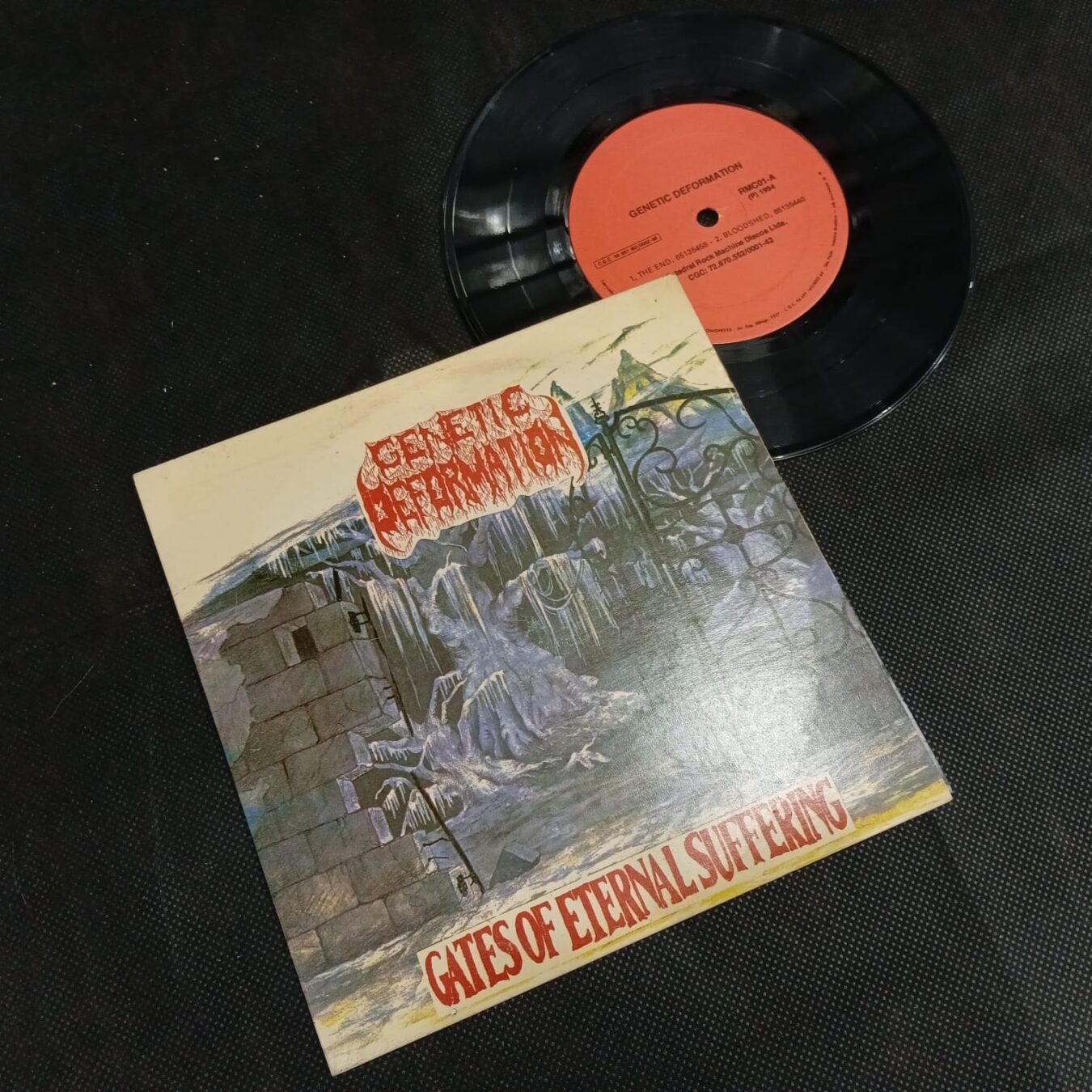 Genetic Deformation – Gates Of Eternal Suffering (LP COMPACTO 7'' USADO)