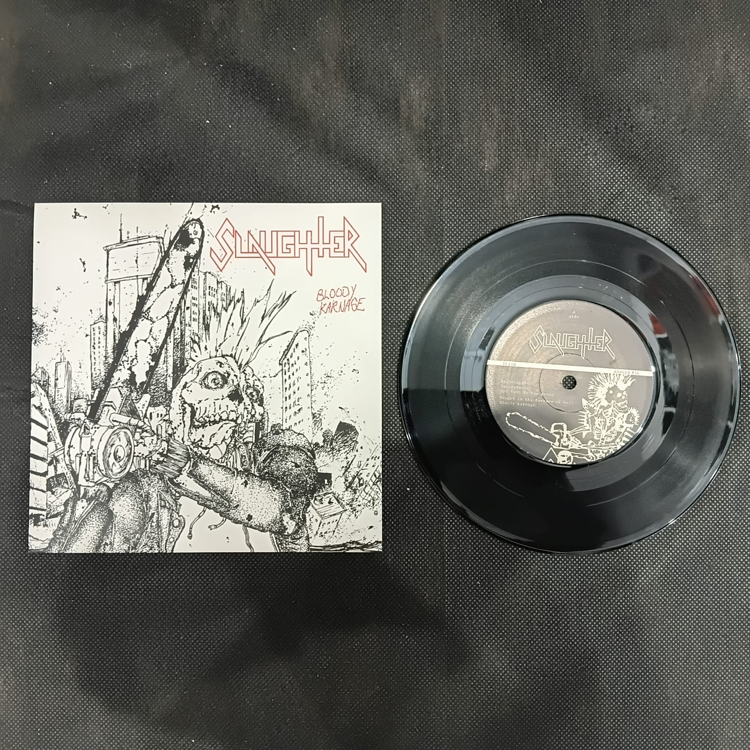 Slaughter – Bloody Karnage (LP COMPACTO 7'' USADO) - Imagem 2