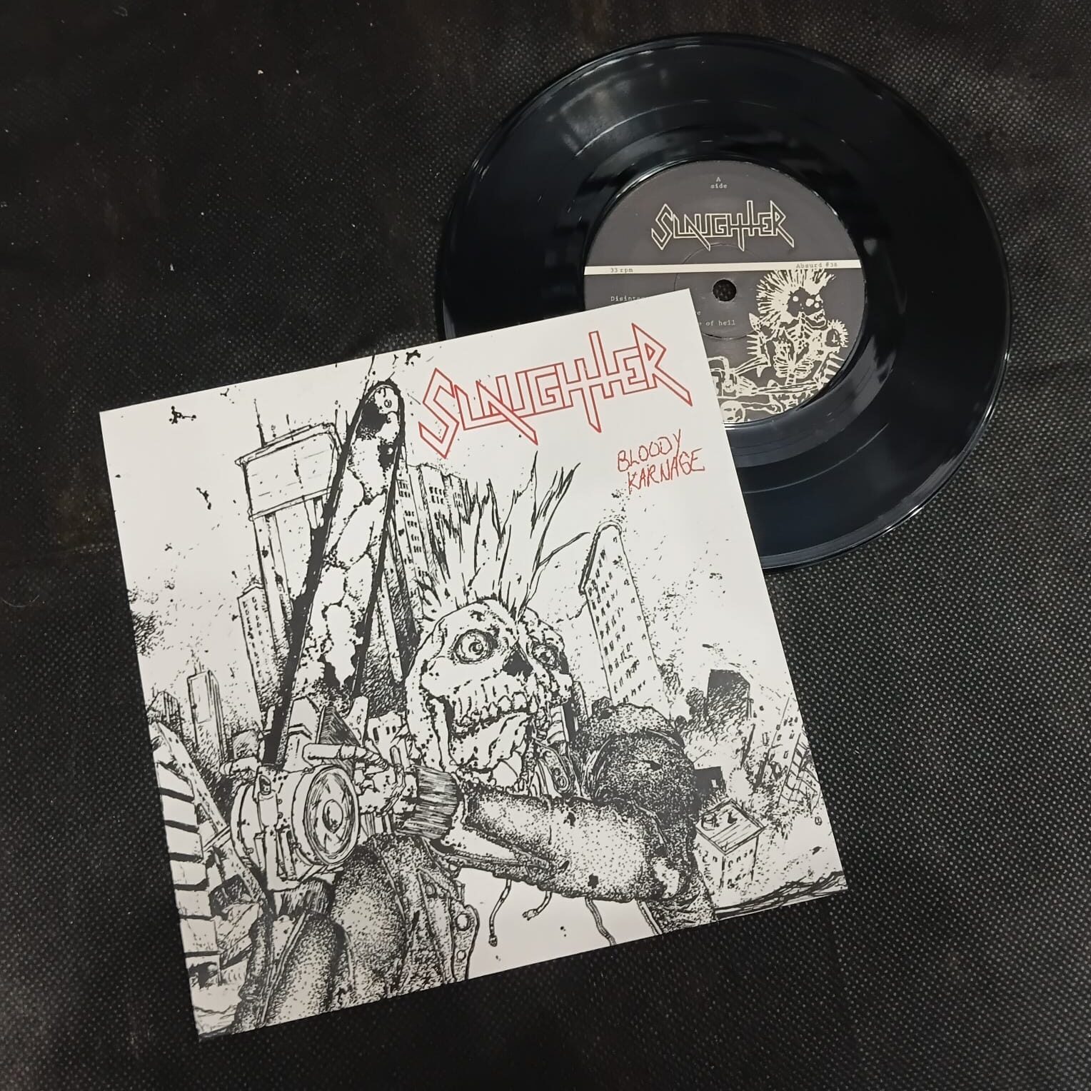 Slaughter – Bloody Karnage (LP COMPACTO 7'' USADO)